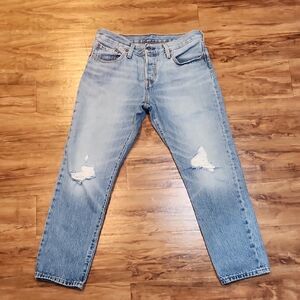 Levi's Light Blue Straight Jeans with Distressed Details